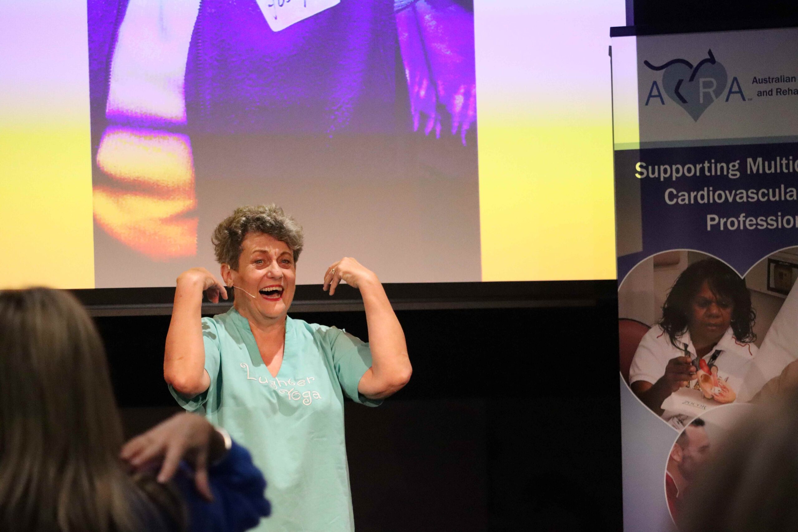 HeatherJoy Campbell, Laughter Yoga international Ambassador, presents at a conference on heart health