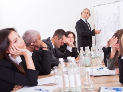 Photo Of Sad Business Team Attending The Seminar
